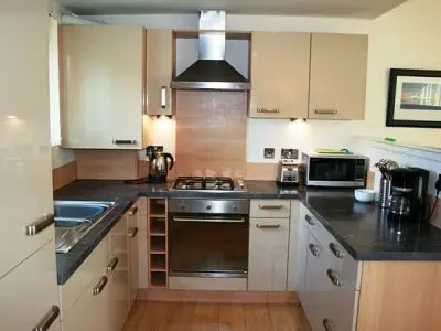 Open plan kitchen to lounge